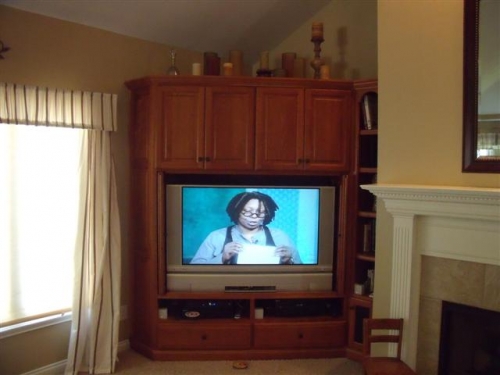 Entertainment Center with Flipper Doors Open
