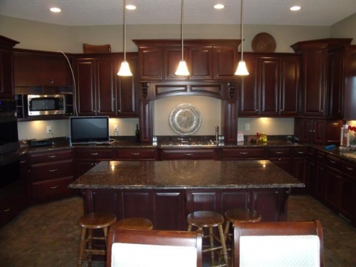 Cherry Hood with Raised Paneled Arched Valance