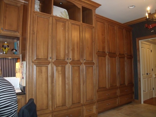 Built-ins with Flipper Doors to Hide Washer and Dryer