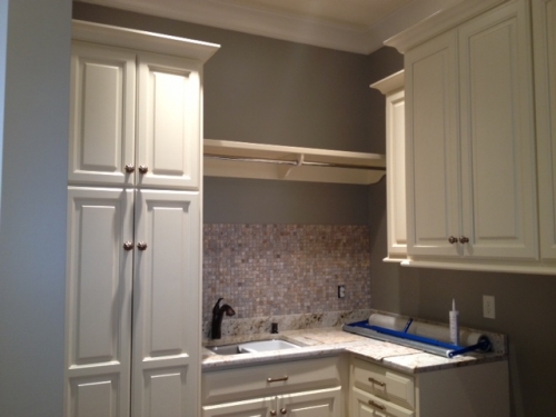 Laundry Room with Shelf and Hanging Rod