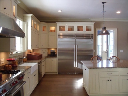 Refrigerator Cabinet with Glass Cabinets and Lighting Above