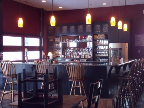 Bar Painted Black with Art Glass Cabinets and Mirrored Back